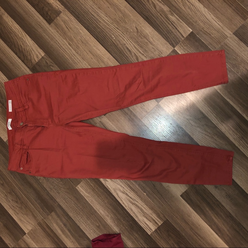 Rust color skinny ankle jeans
